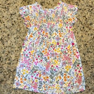 Smocked flutter sleeve floral top